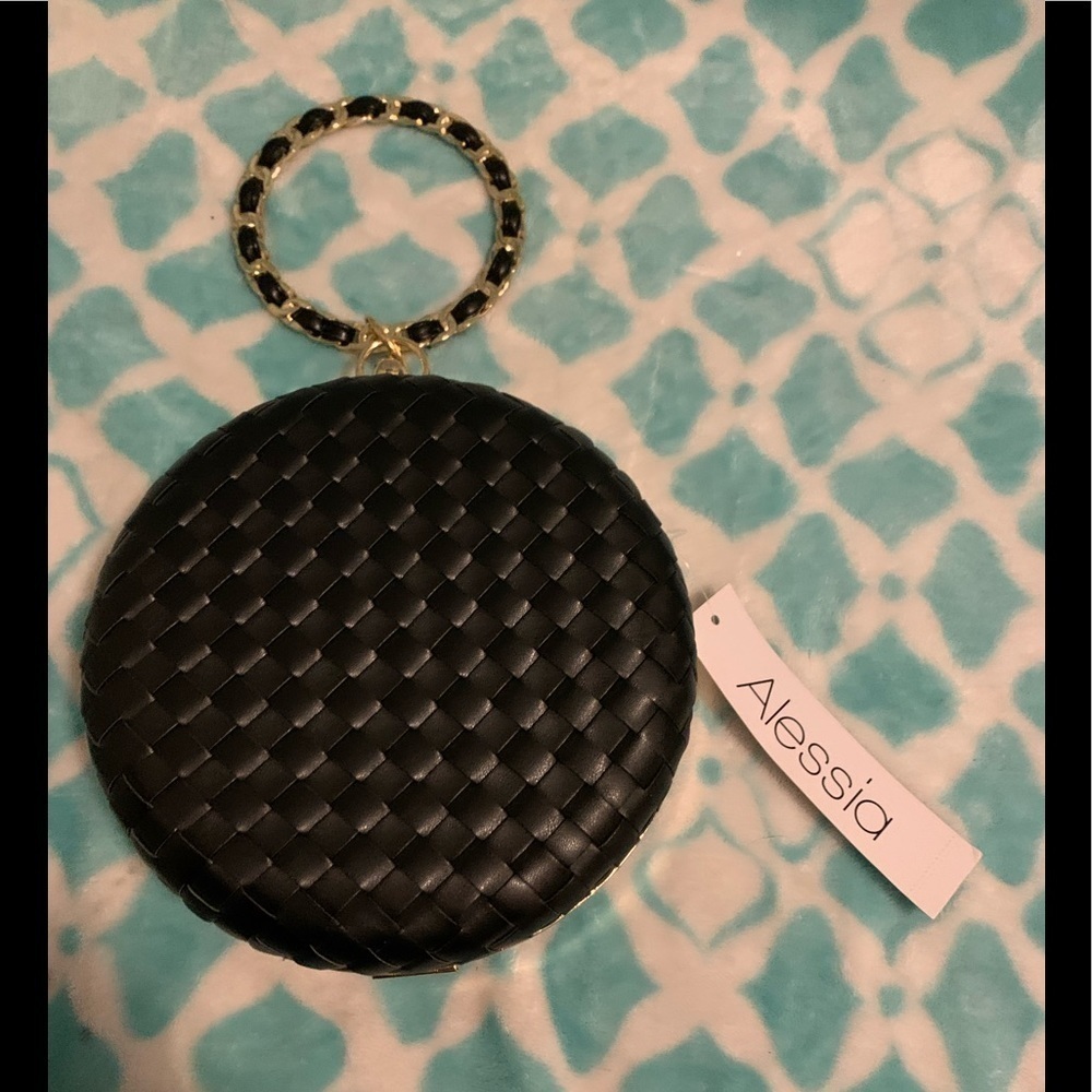 Alessia faux leather bracelet strap clutch bag